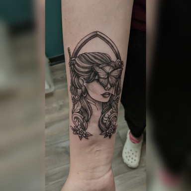 Woman's Face with Butterfly