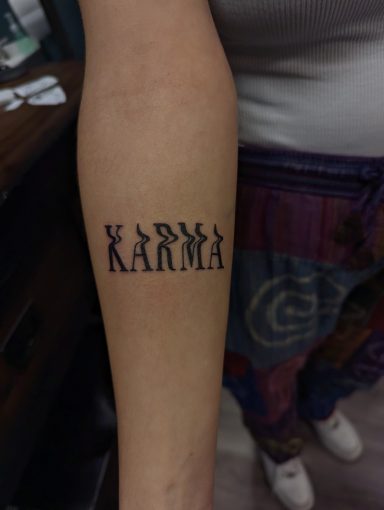 Karma on Inner Forearm